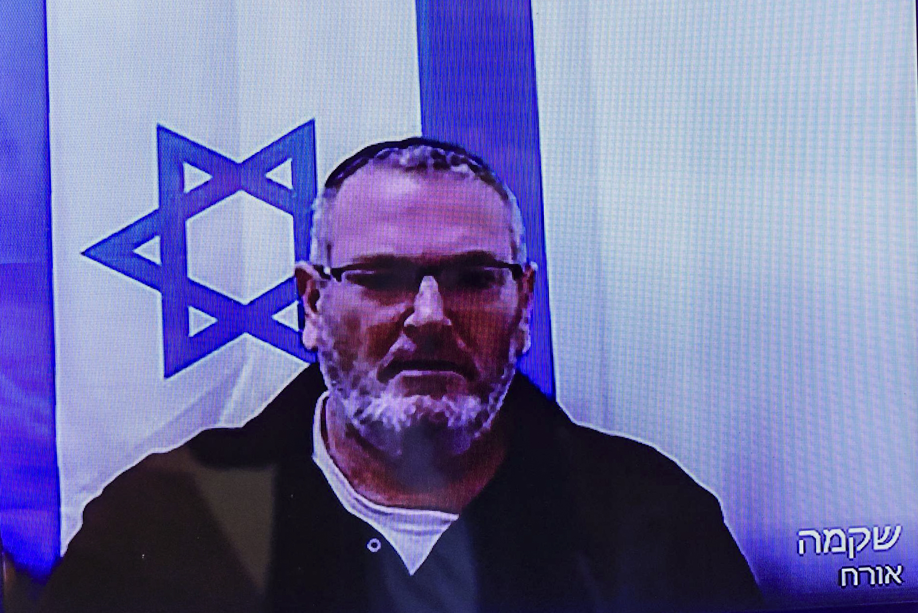 "אין תשתית ראייתית לעבירות ביטחוניות". בצלאל זיני בדיון מרחוק בבית המשפט המחוזי. צילום: צפריר אביוב, פלאש 90